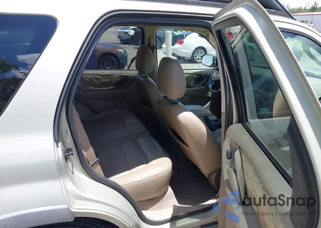 1FMYU03165KB42372: 42586341