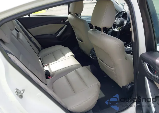 JM1GJ1V64E1147289: 42593747