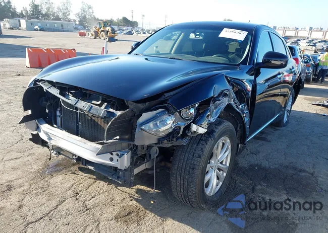 JN8CS1MUXFM381615: 42598307