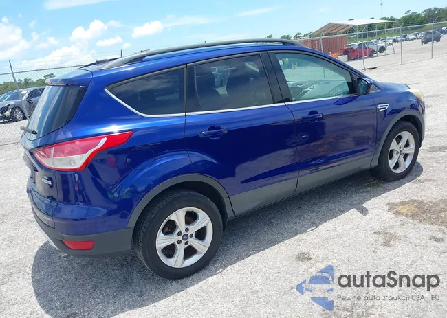 1FMCU0GX7EUD48992: 42601574