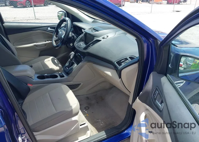 1FMCU0GX7EUD48992: 42601574