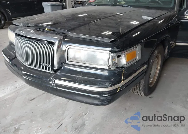 1LNLM82W3VY753379: 42603602