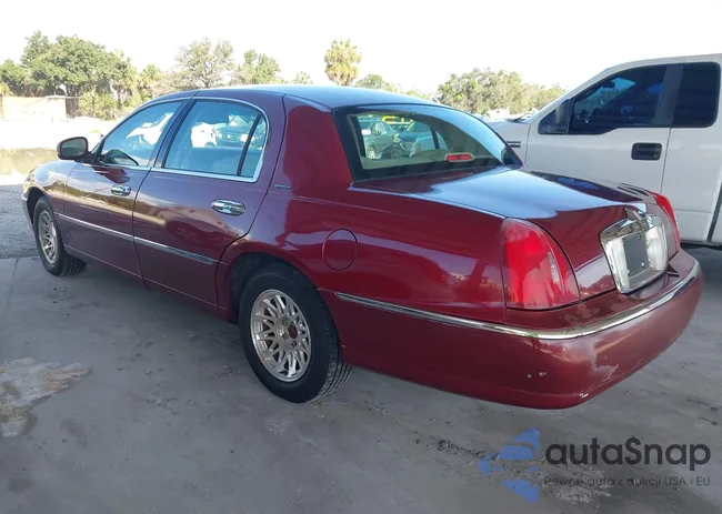 1LNHM82W3XY661875: 42608146