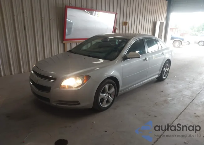 1G1ZD5EU5CF370553: 42641583