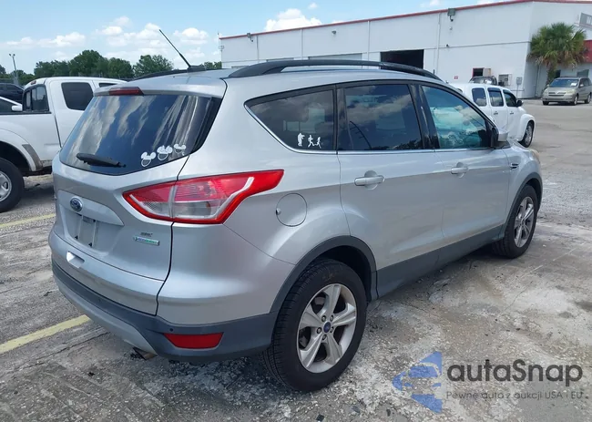 1FMCU0GX5EUE20935: 42642511