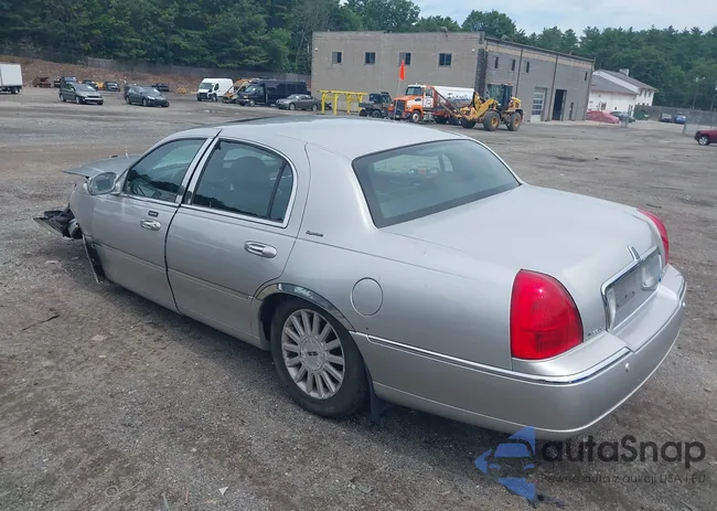 1LNHM82W13Y696408: 42648664