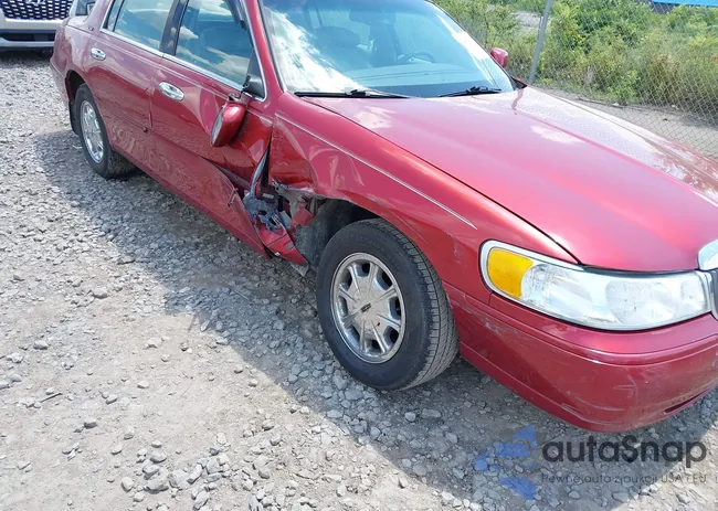 1LNHM82W9XY628587: 42659329