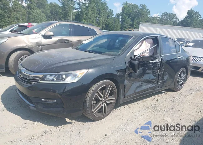 1HGCR2F54GA163449: 42669840