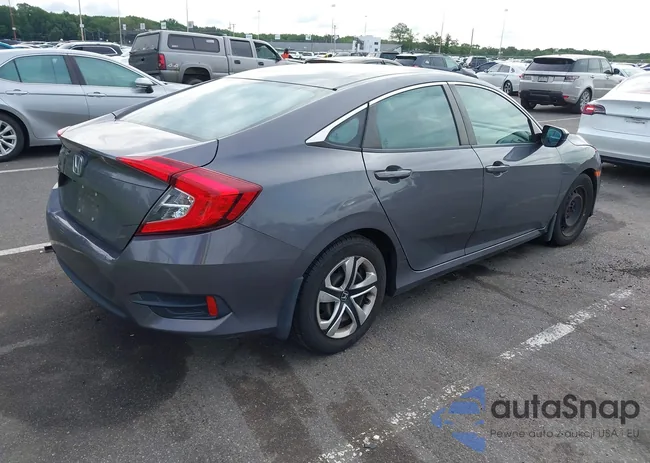 2HGFC2F52JH563940: 42763401