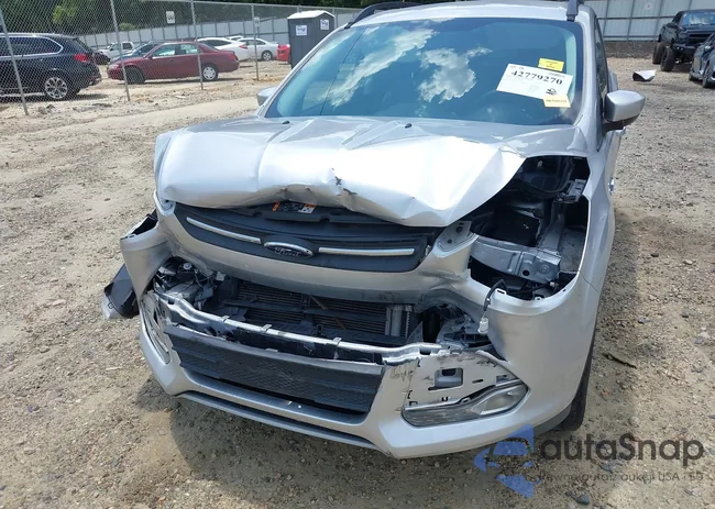 1FMCU0GXXEUE39142: 42779270