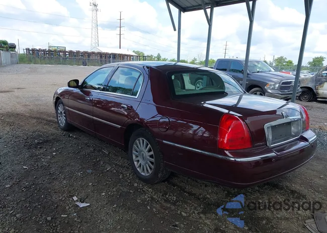 1LNHM83W34Y634590: 42798579