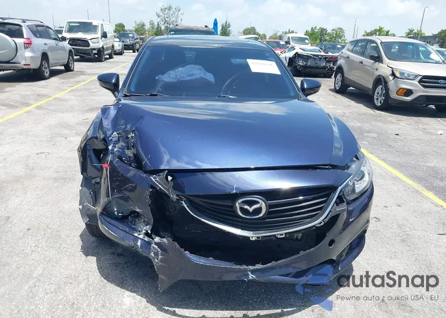 JM1GJ1V55F1209050: 42840246