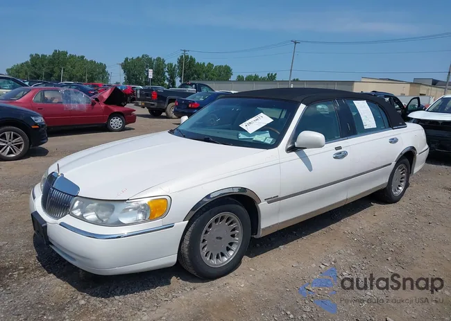 1LNHM83W2YY923563: 42855073