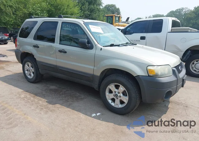 1FMYU031X5KE15555: 42864491