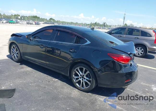 JM1GJ1W69E1162465: 42873008