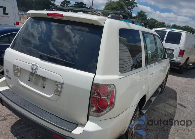 5FNYF28577B015460: 42899326