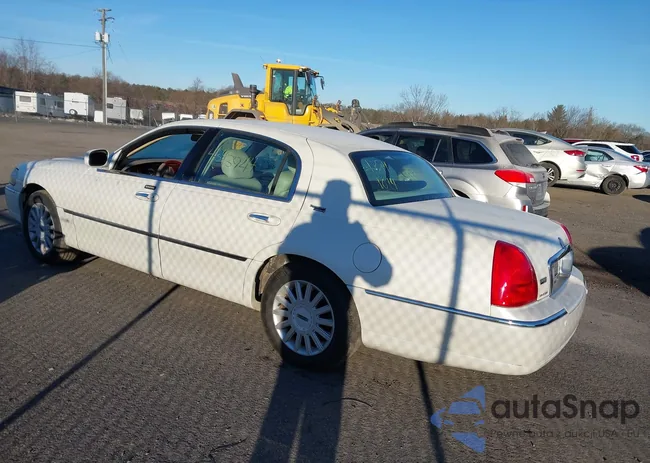 1LNHM82W65Y637633: 43941014