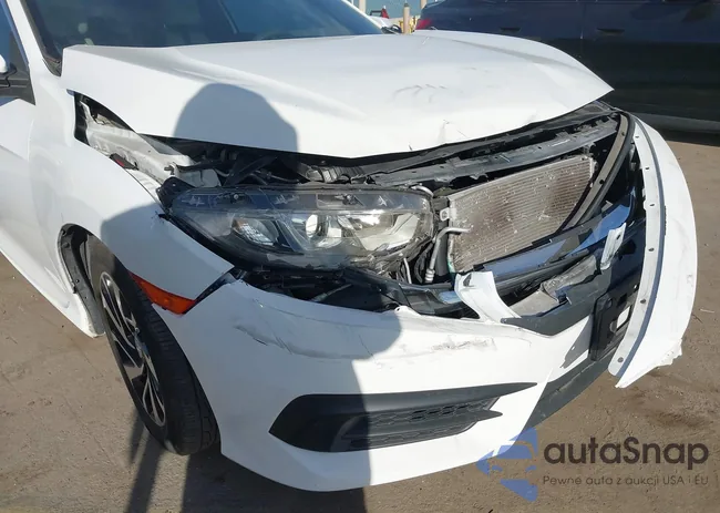 2HGFC4B0XGH303266: 43957011