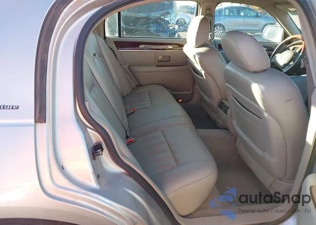 1LNHM82W03Y671774: 43956458