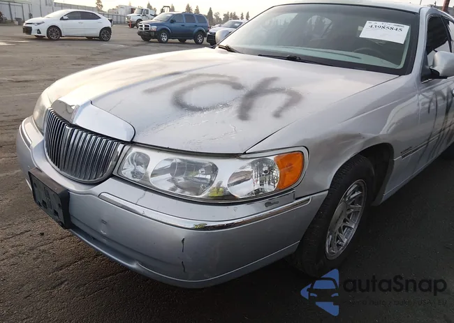 1LNHM82W1XY612917: 43985845