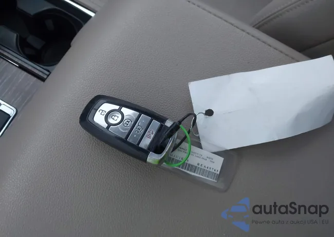 1FMJU1K88REA45765: 43999877