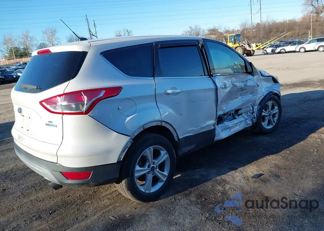 1FMCU0GX9EUD70704: 44020867