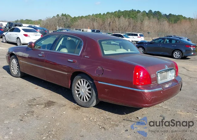 1LNHM82W03Y604379: 44025585