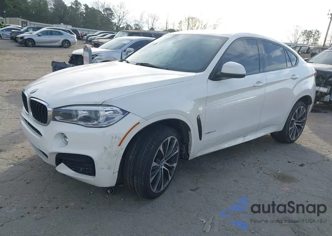 5UXKU2C57J0X51077: 44033174