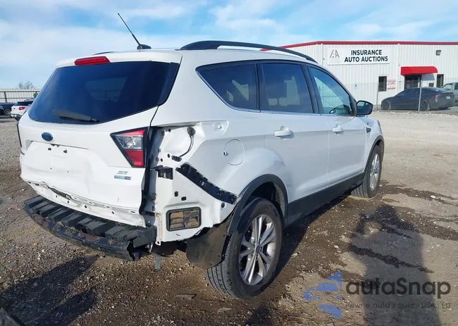 1FMCU9GD4JUA11734: 44043841