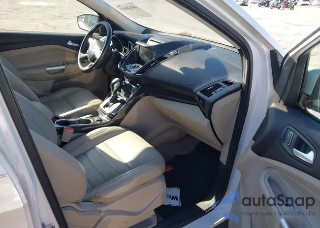 1FMCU0JX2EUD55874: 44048069