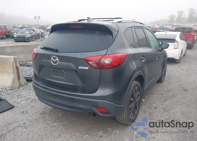 JM3KE4DYXG0833565: 44077234