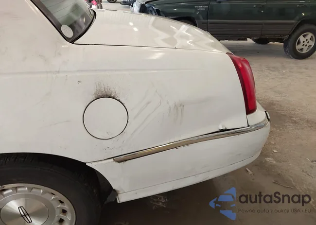 1LNHM81WXXY718705: 44085891