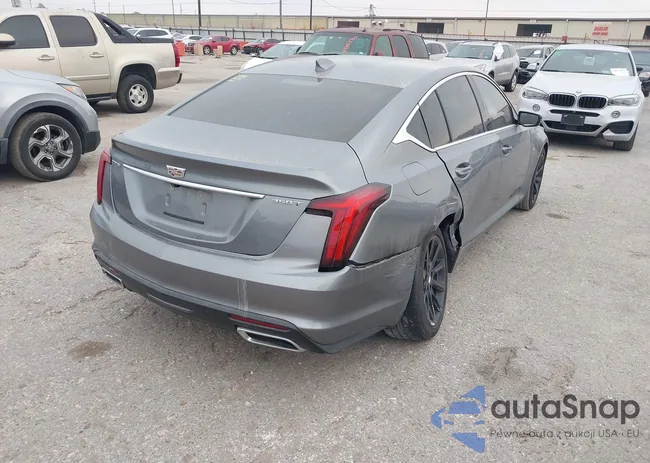 1G6DM5RK9L0136674: 44086804