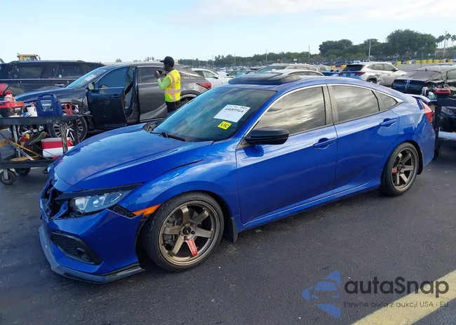 2HGFC1E56JH704584: 44089564