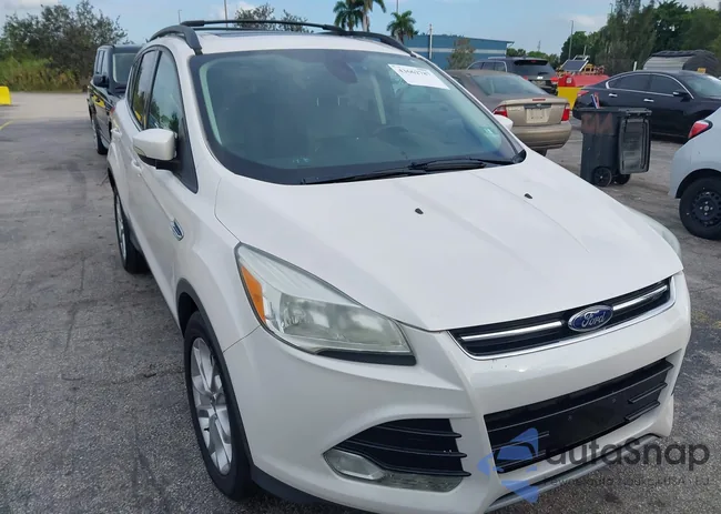 1FMCU9HXXDUD82944: 44117025