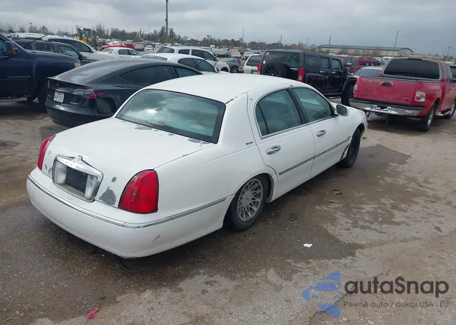 1LNHM82W42Y659125: 44120432