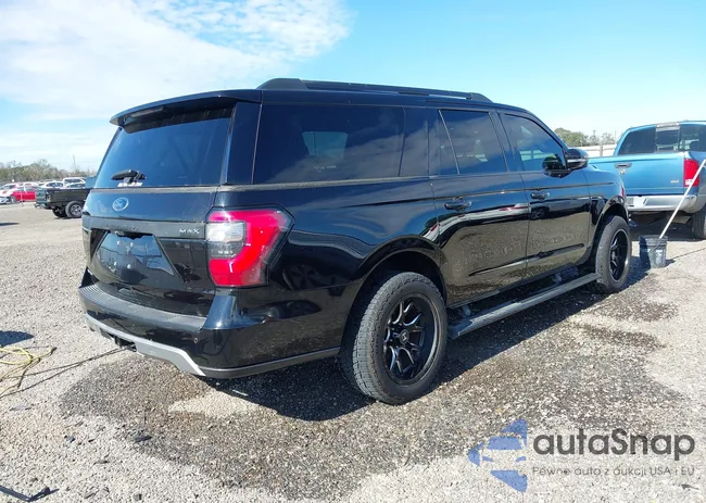 1FMJK1KT4KEA19356: 44124818