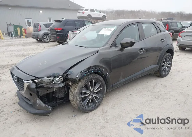 JM1DKFC7XJ0308592: 44203236