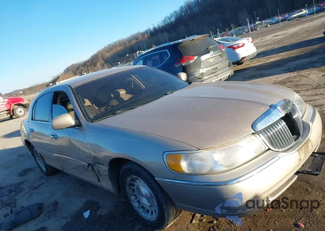 1LNFM81W9WY703375: 44209998