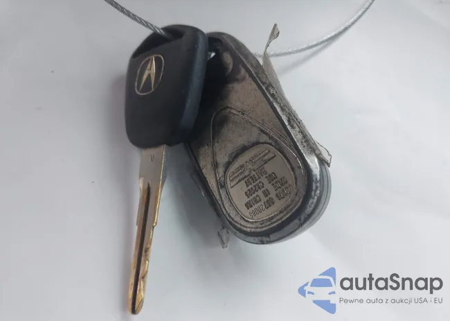 JH4CL95814C002673: 44215564