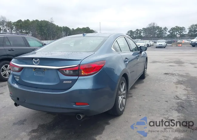 JM1GJ1W65E1160356: 44233524