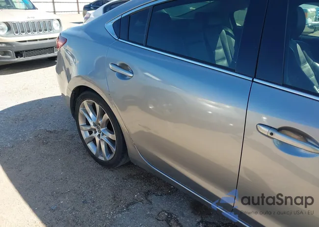 JM1GJ1W57E1112705: 44269635