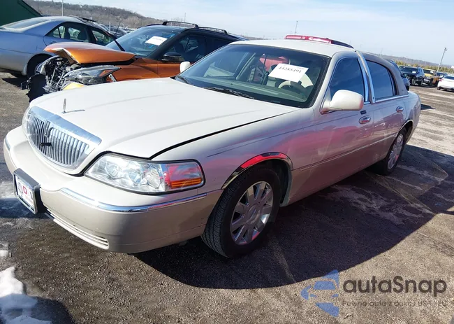 1LNHM82W55Y608589: 44285491