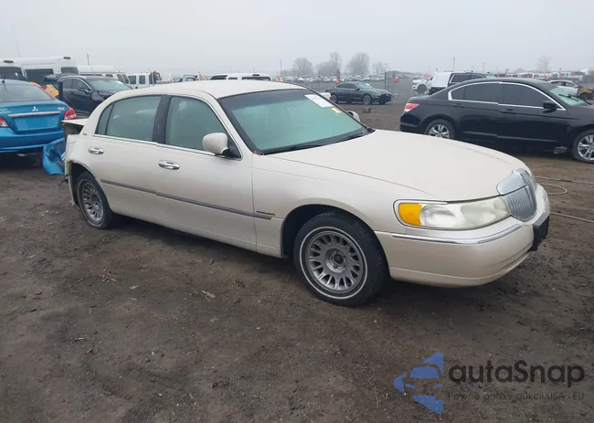 1LNHM83W81Y706833: 44376144