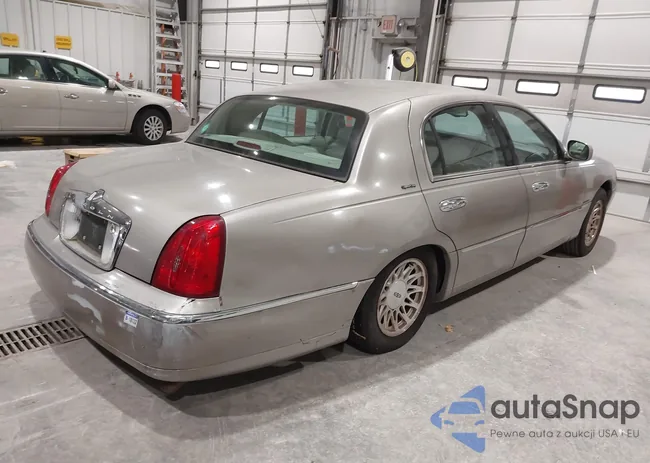 1LNHM82W4XY663084: 44385086