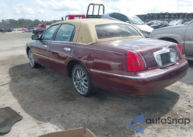 1LNHM82W9YY815765: 44386181