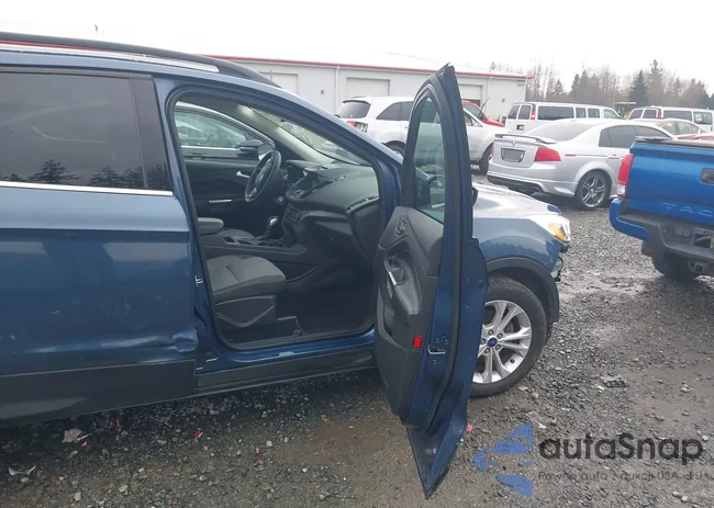 1FMCU0GDXJUA70573: 44388461