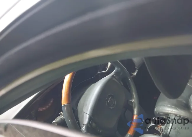 1G6KE57Y42U203619: 44389913