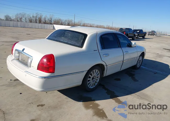 1LNHM81W45Y611839: 44390348