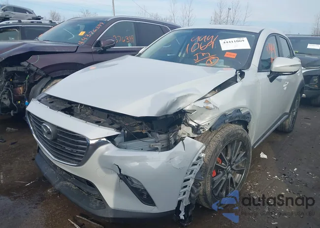 JM1DKFD76H0143598: 44411069